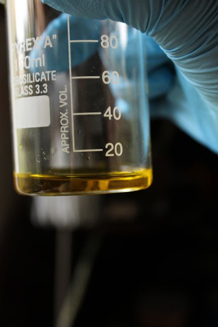 Laboratory beaker showing precise measurements for nutrition formula