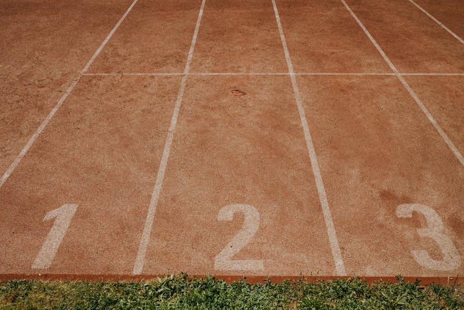 Athlete starting lane number 3 on a professional running track
