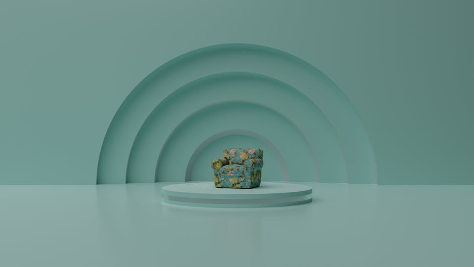 A single comfortable patterned armchair on a circular pedestal under an archway